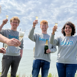 Tech team SeaO2 celebrating first batch of CO2 captured from sea
