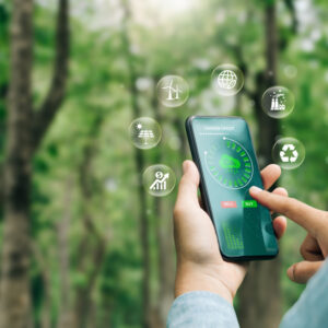 carbon credit concept. Man using a smartphone to trade carbon credit on application. carbon etf to invest in sustainable business. Carbon neutral balancing CO2 emission offset.Net zero emission.